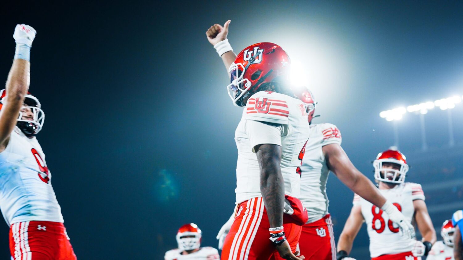 Devon Dampier, Utah teammates celebrating touchdown vs UCLA...