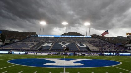 Governor Of Utah Passes Out Ice Cream To West Virginia Fans At BYU Game