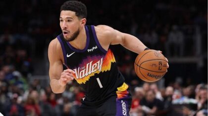 Devin Booker wears BYU Nike 'Book 2' shoes during Phoenix Suns game