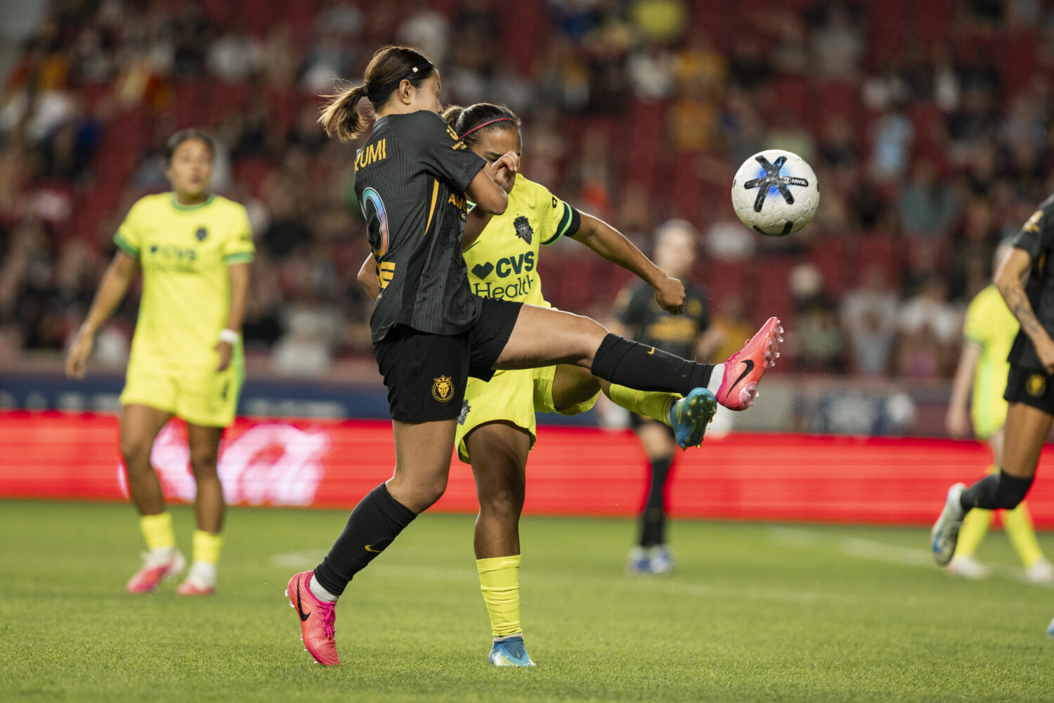 Utah Royals midfielder Narumi battles for possession during an NWSL match against the Washington Sp...