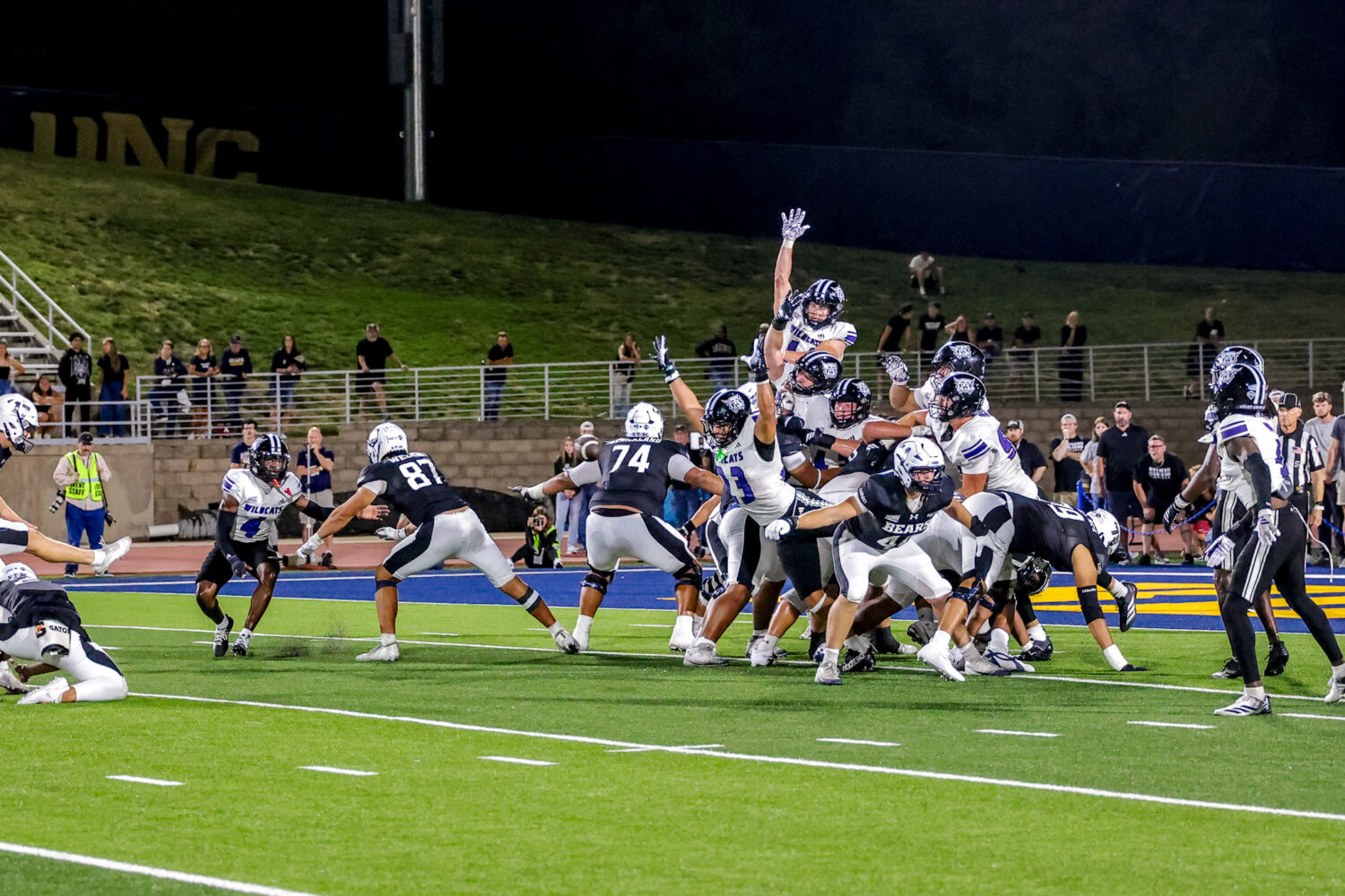 Freshman Zach Smith blocked a PAT with three seconds remaining as Weber State survived Northern Col...