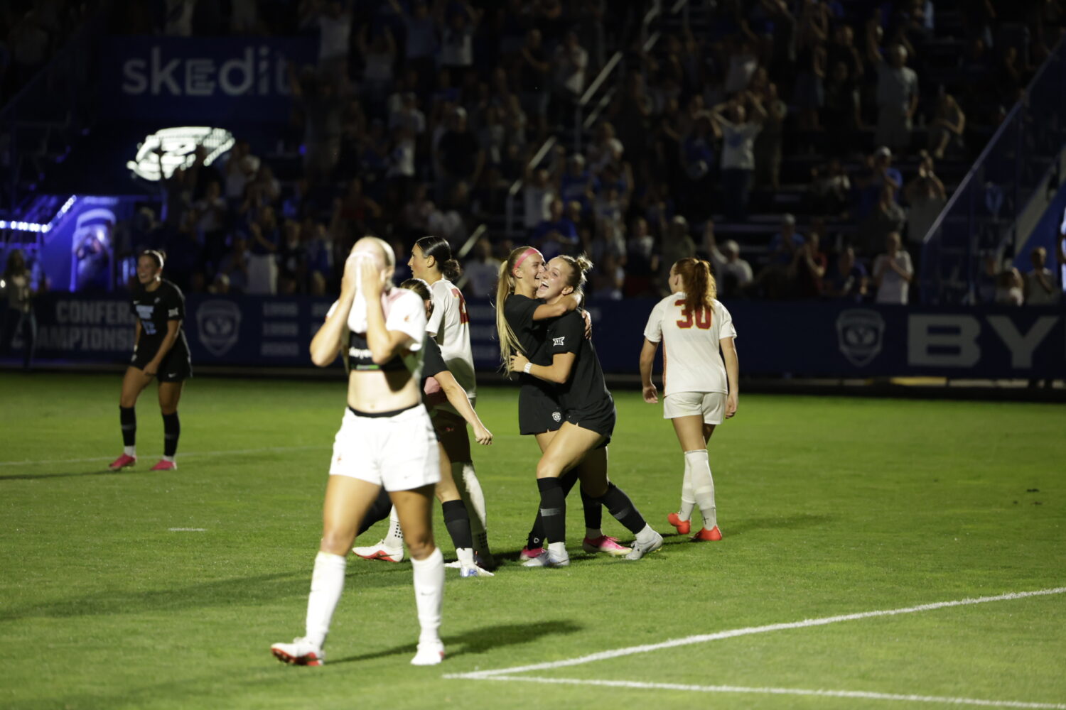 BYU women's soccer celebrates one of two goals from Emma Hamberlin during the No. 9 Cougars' 2-0 wi...
