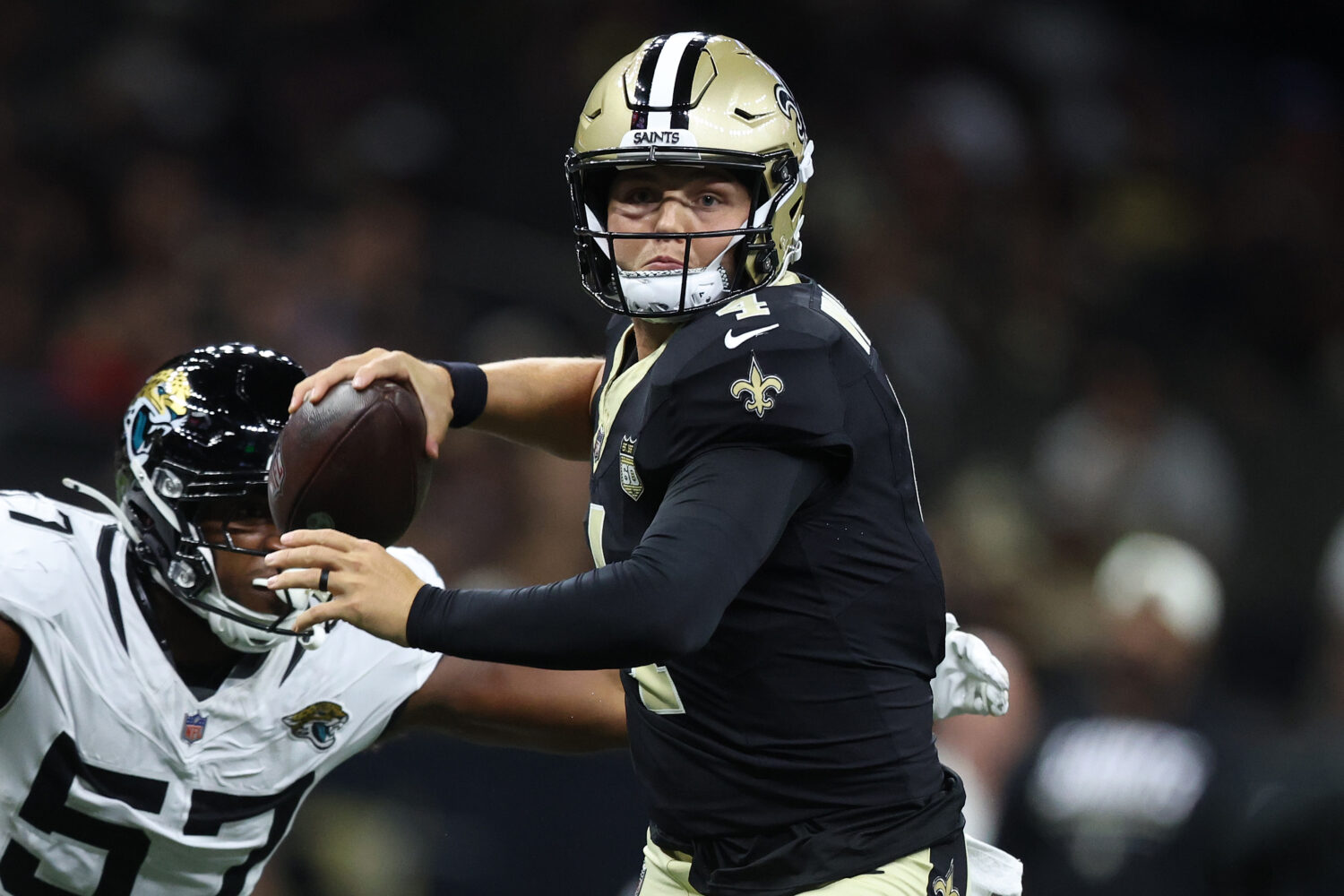 New Orleans Saints quarterback Zach Wilson throws a pass against the Jacksonville Jaguars at Caesar...