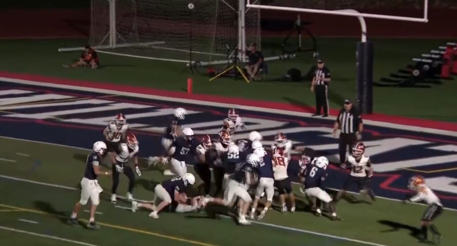 Sam Bahr scores the game-winning touchdown as Woods Cross survives West Field, 26-21 in a Utah high...