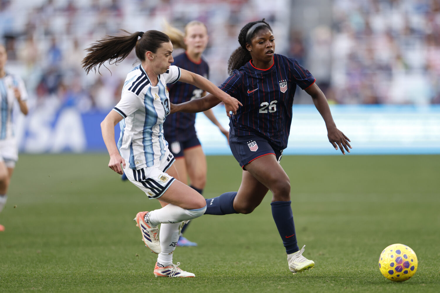 NASHVILLE, TENNESSEE - MARCH 01: Jameese Joseph #26 of United States dribbles the ball against Soph...