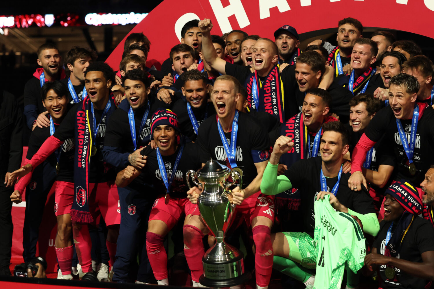 Timo Baumgartl #32 of ST Louis City SC lifts the Champion's trophy after winning the Lamar Hunt U.S...