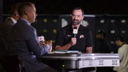 Utah basketball head coach Alex Jensen at Big 12 media days....